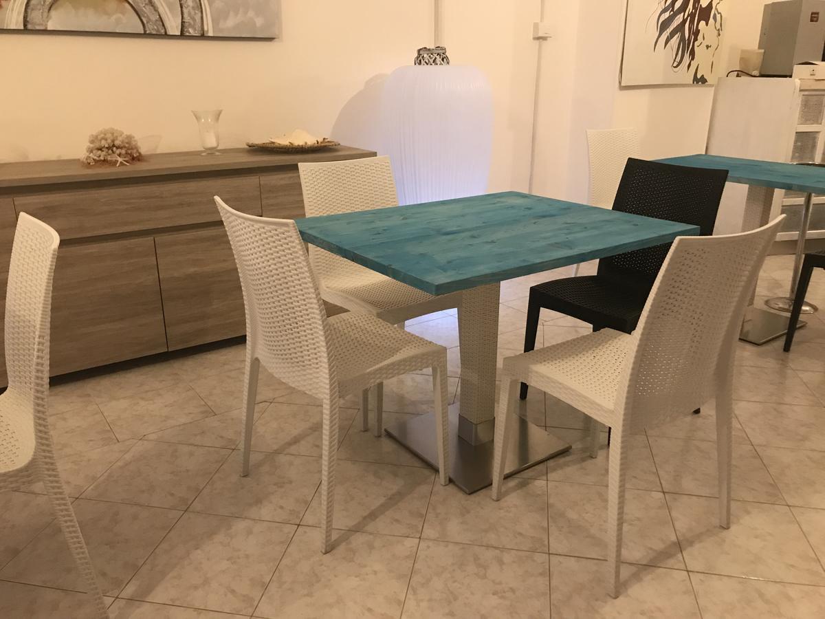 Hotel Il Riccio Порто Чезарео Екстериор снимка